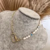 Collar broche rectangular + perla de rio y ojo turco Chapa de oro 18k